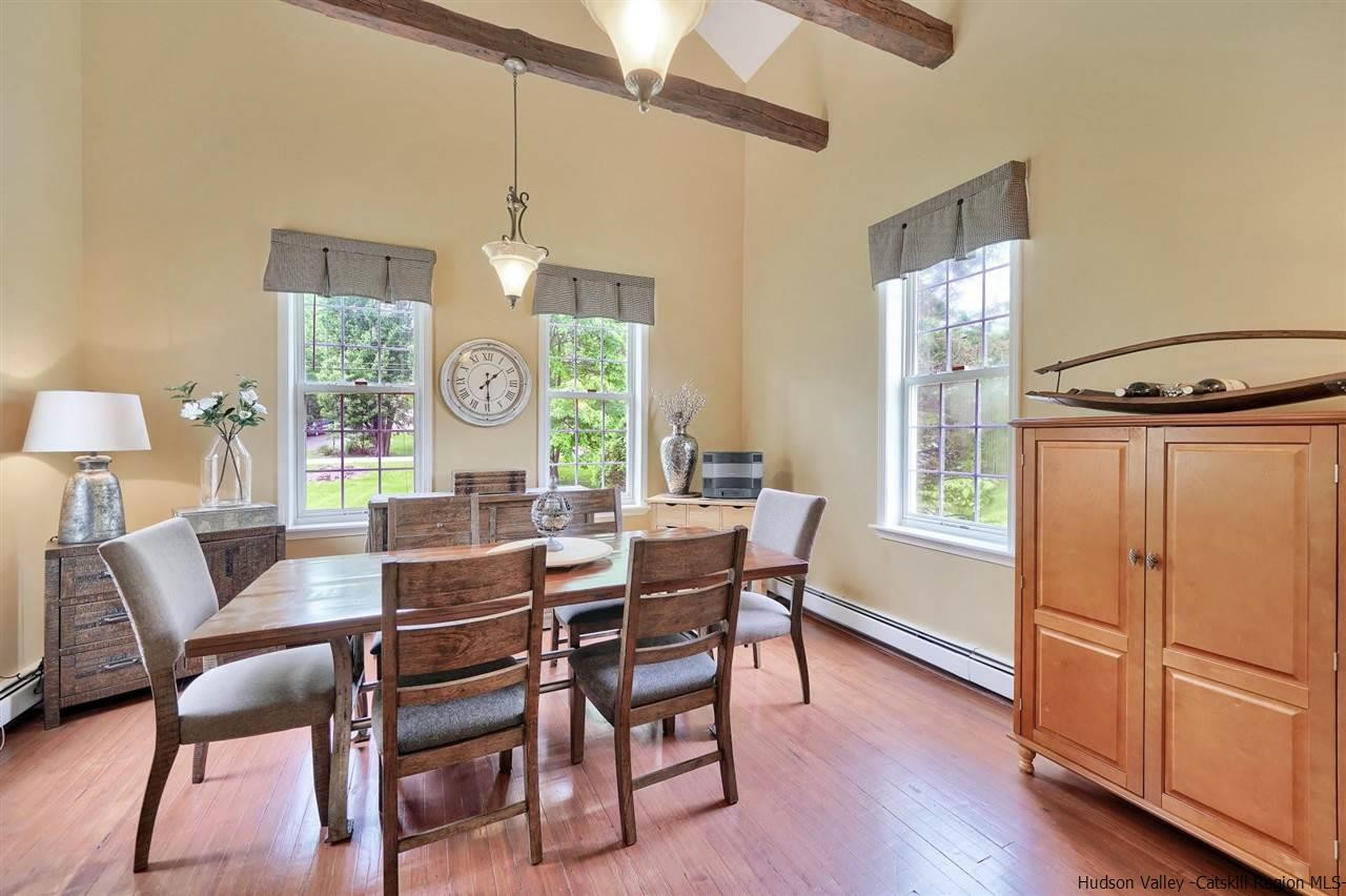 78 E Road Wallkill, NY 12589 - Photo 7 of 27 a view of a dining room with furniture window and wooden floor