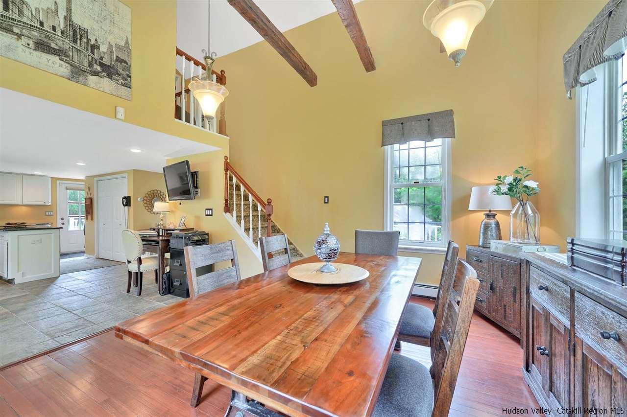 78 E Road Wallkill, NY 12589 - Photo 9 of 27 a dining room with furniture and wooden floor