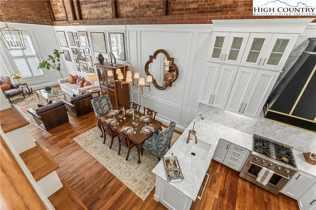 a view of living room and kitchen with furniture