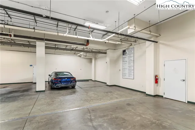 a view of a brick building with many windows