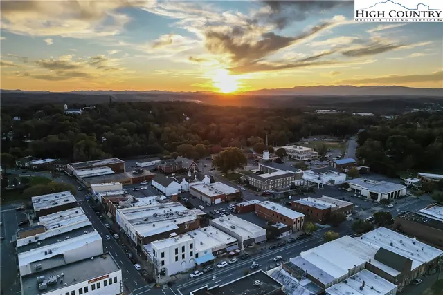 a view of a patio with wooden floor