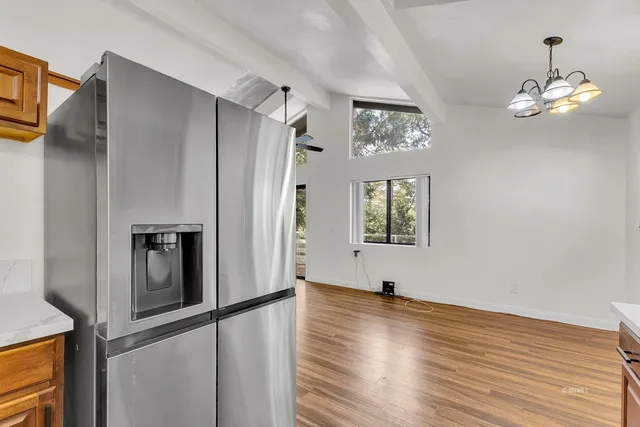 a view of balcony with furniture