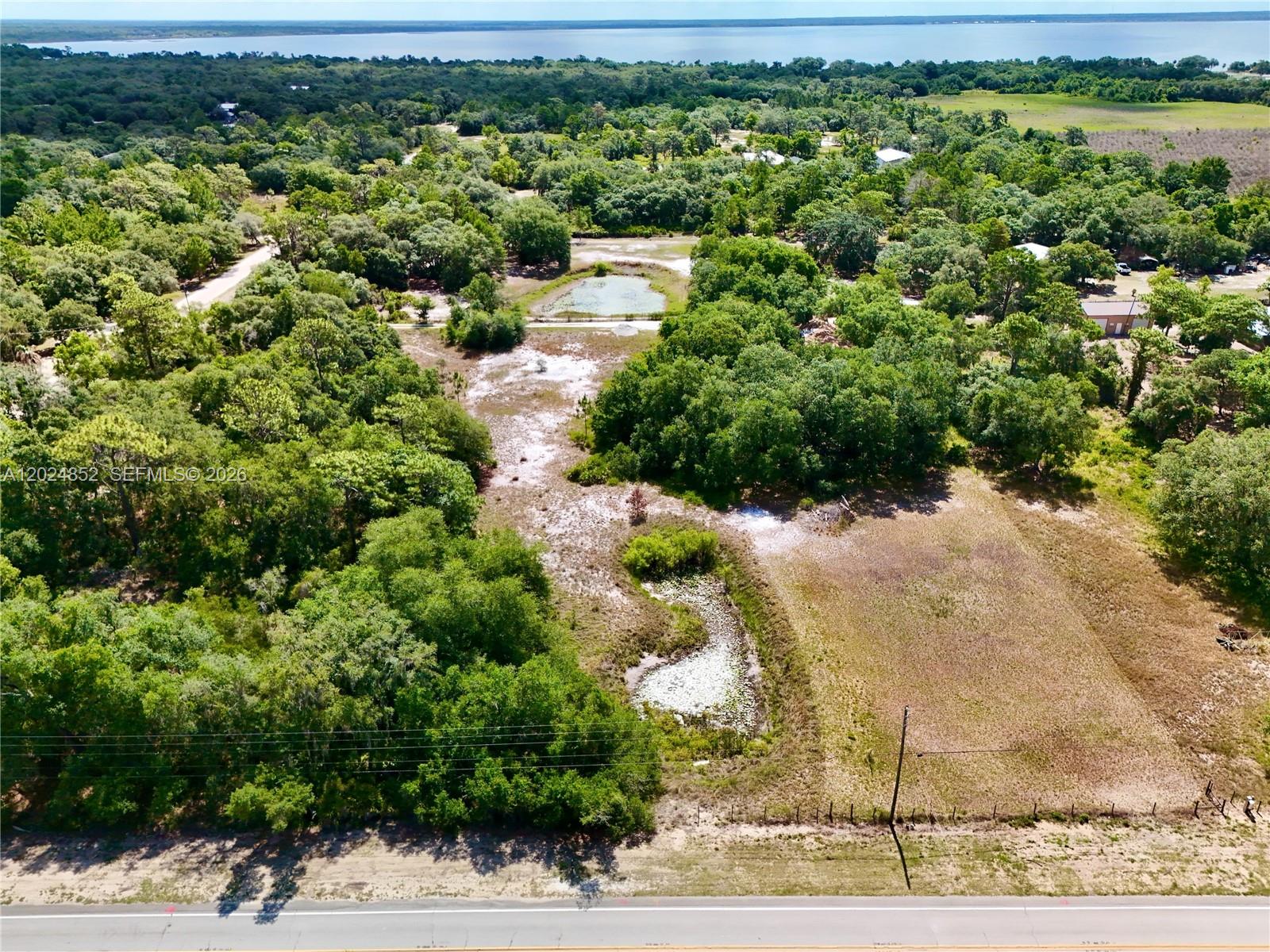 3175 Walk In Water Road Lake Wales, FL 33898 - Photo 31 of 35 a view of a garden with a pathway