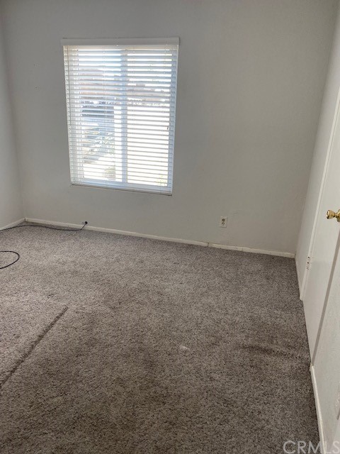 212 South Kraemer Boulevard, Unit 1205 Placentia, CA 92870 - Photo 4 of 11 an empty room with a window