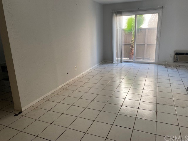 212 South Kraemer Boulevard, Unit 1205 Placentia, CA 92870 - Photo 8 of 11 an empty room with windows