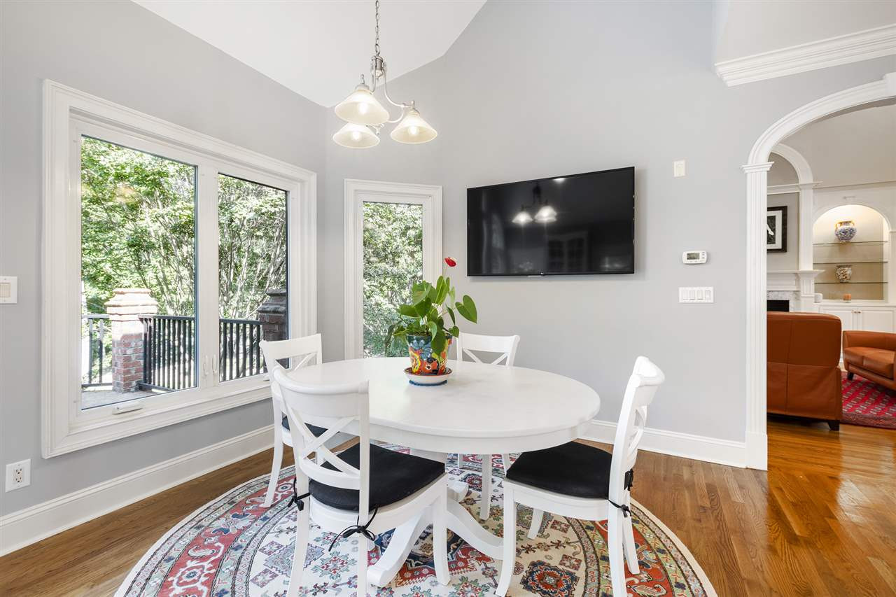 1102 Stonebridge Drive Durham, NC 27712 - Photo 12 of 30 a living room with furniture and a flat screen tv