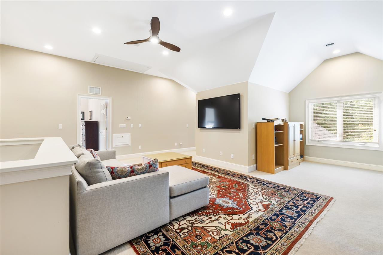 1102 Stonebridge Drive Durham, NC 27712 - Photo 17 of 30 a living room with furniture and a flat screen tv