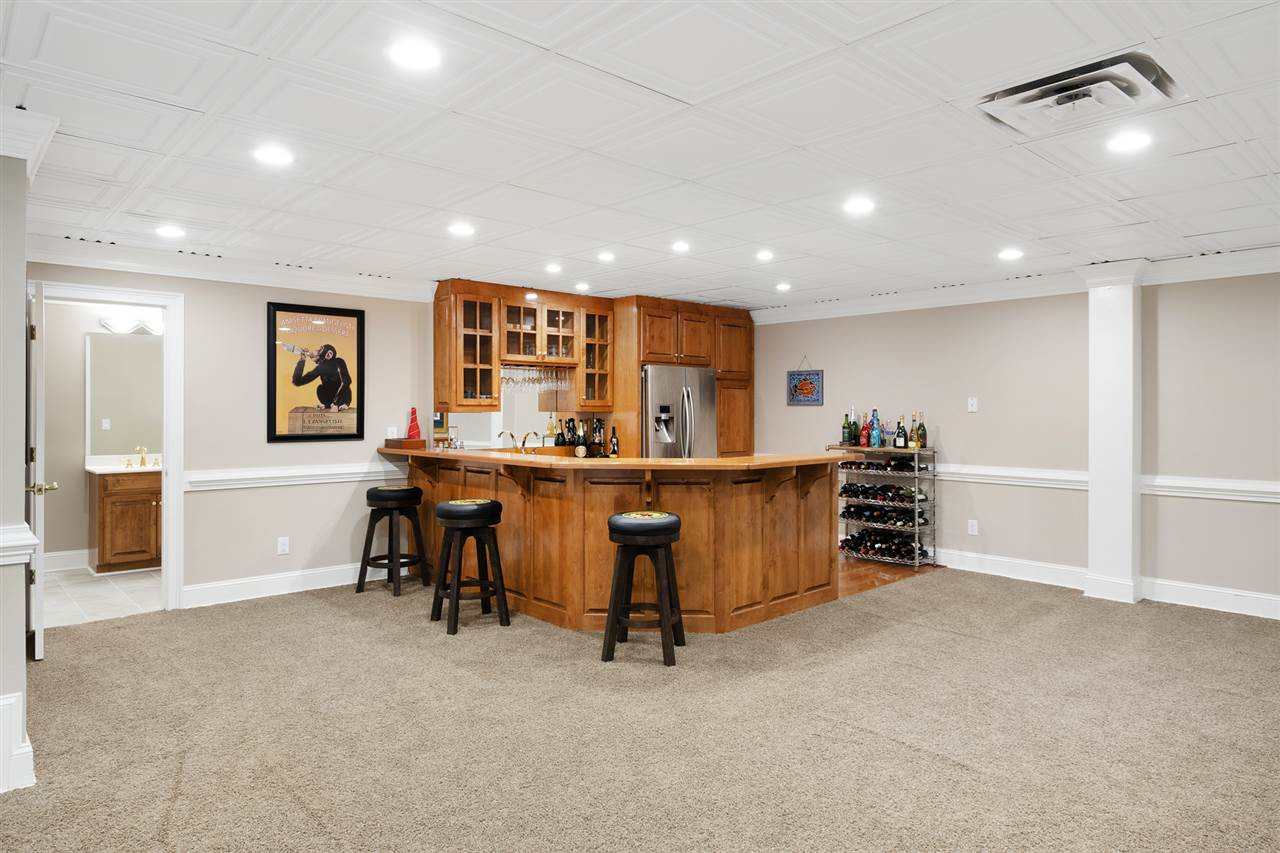 1102 Stonebridge Drive Durham, NC 27712 - Photo 24 of 30 a living room with stainless steel appliances kitchen island furniture and kitchen view