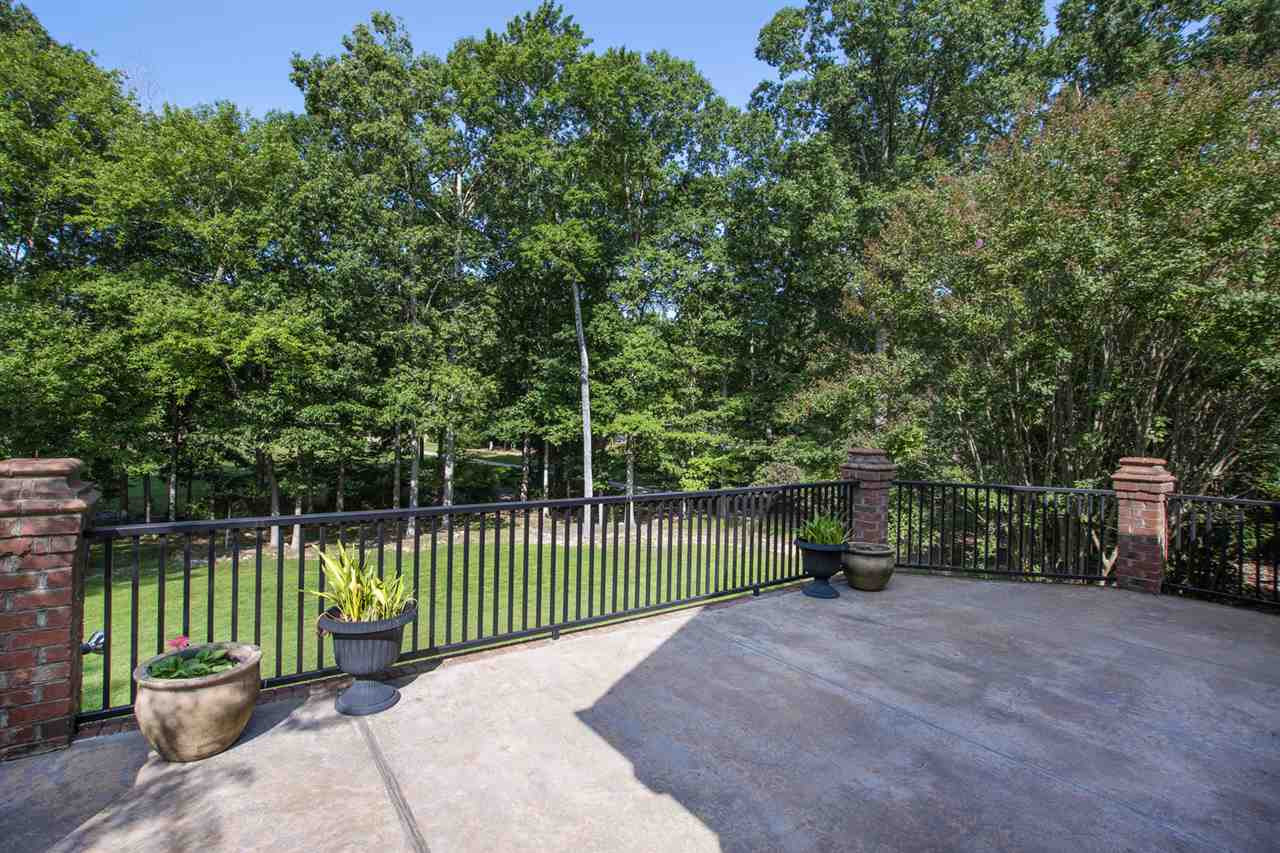 1102 Stonebridge Drive Durham, NC 27712 - Photo 28 of 30 a view of a park with a bench and trees