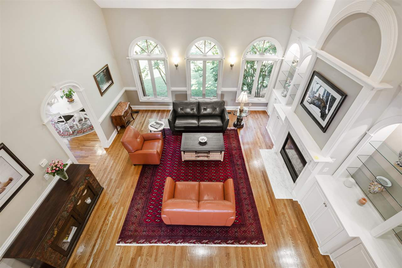 1102 Stonebridge Drive Durham, NC 27712 - Photo 7 of 30 a living room with furniture and a fireplace