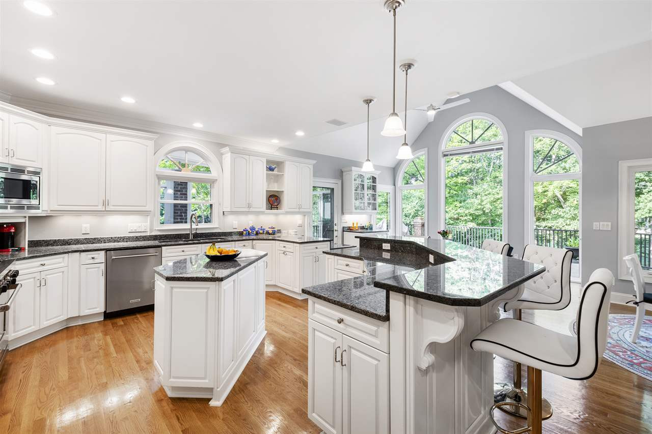 1102 Stonebridge Drive Durham, NC 27712 - Photo 9 of 30 a kitchen with counter space appliances and windows