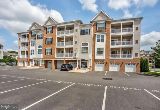 a front view of a building with a street