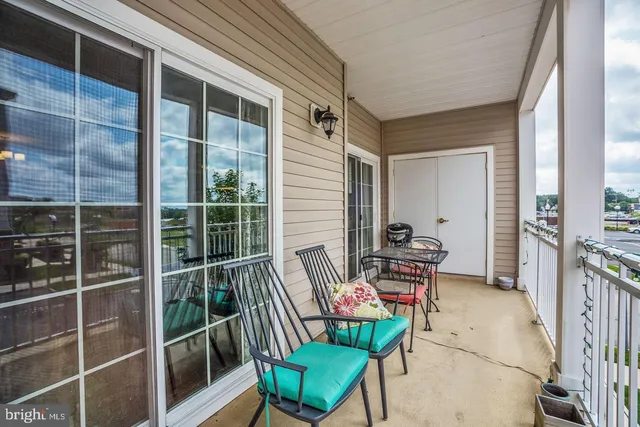 a bathroom with a sink a mirror a bathtub and shower