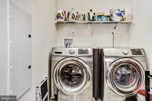 a kitchen with a sink stove and refrigerator