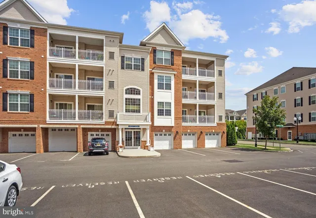a front view of a building with a street