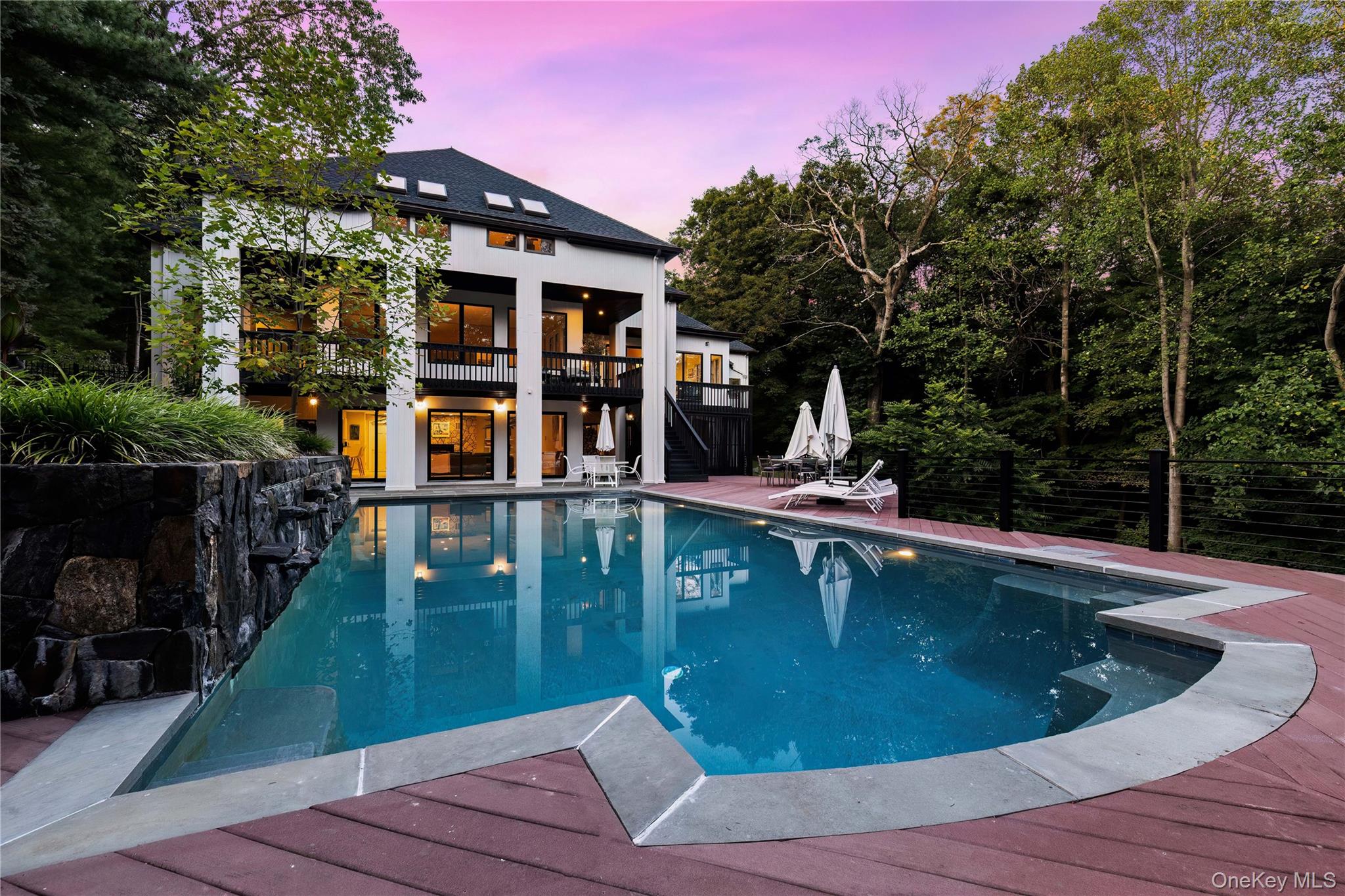 a view of a swimming pool with a patio
