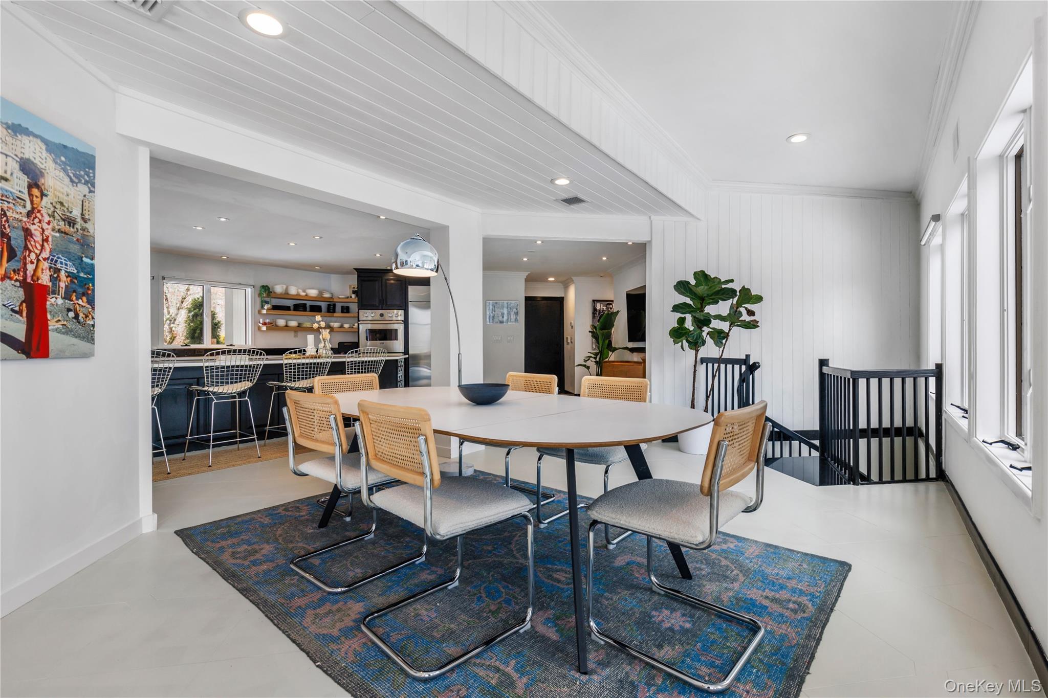 205 Polly Park Road Rye, NY 10580 - Photo 12 of 33 a dining room with furniture and wooden floor