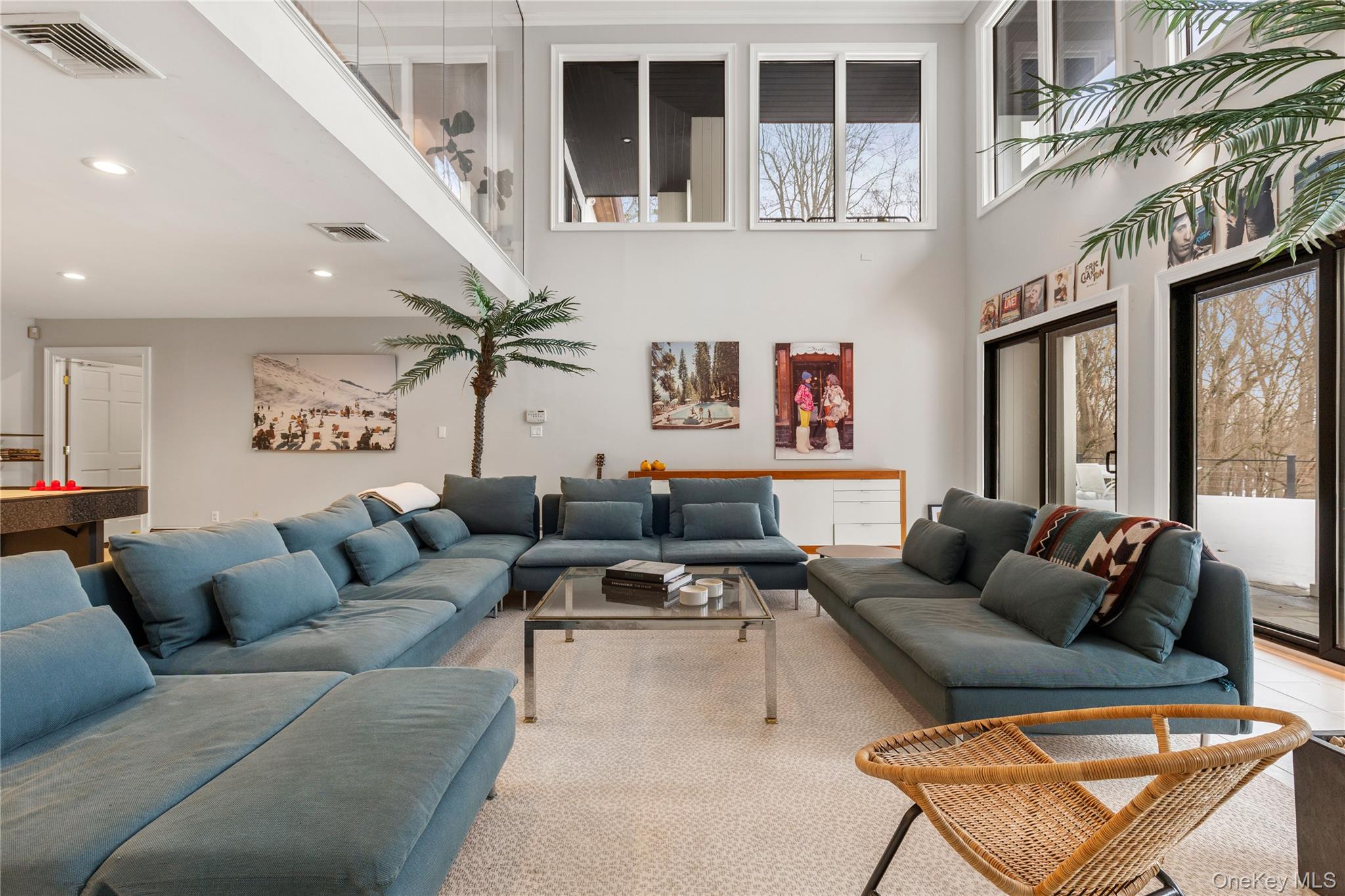 205 Polly Park Road Rye, NY 10580 - Photo 24 of 33 a living room with furniture ceiling fan and a rug