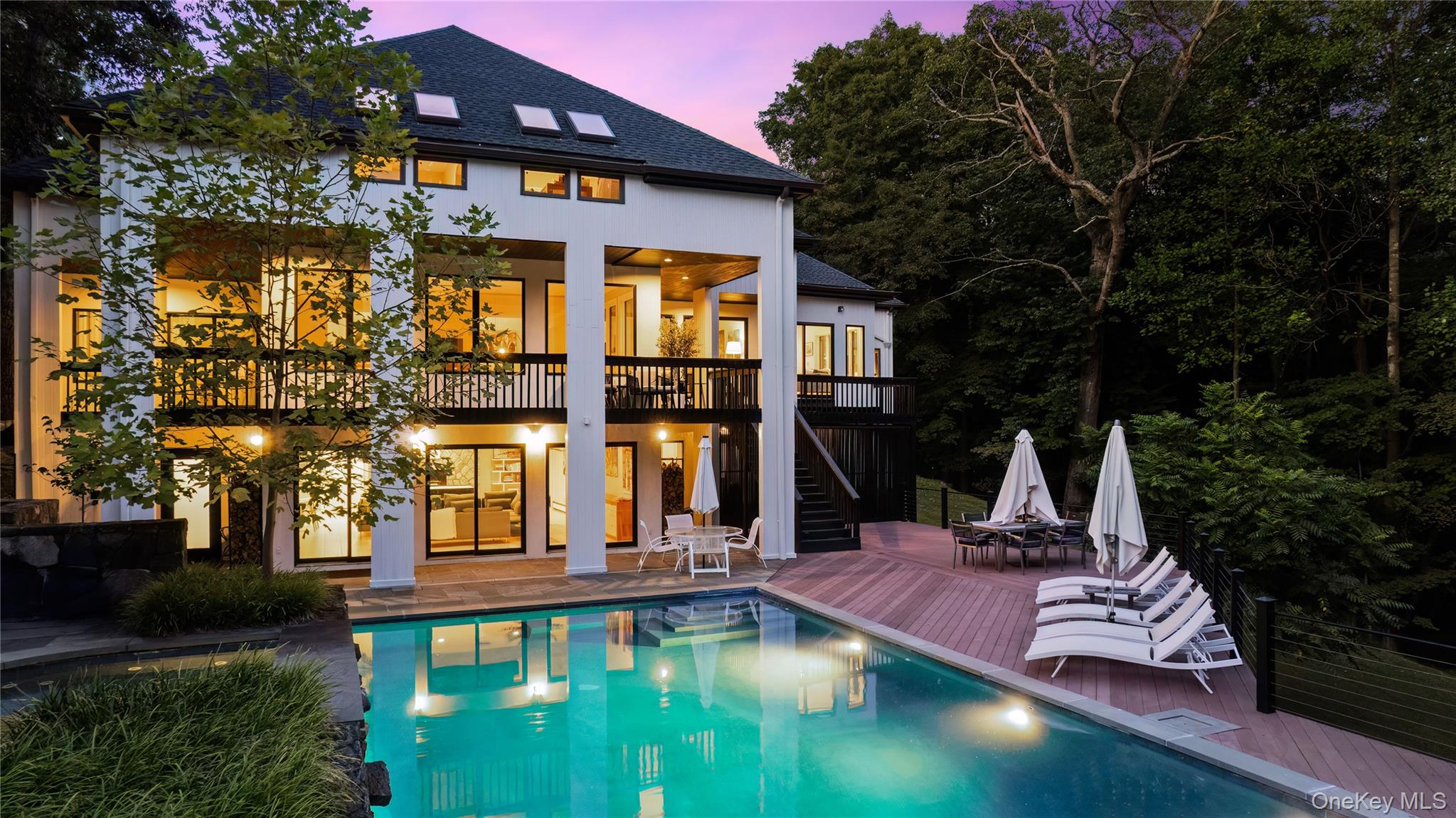 205 Polly Park Road Rye, NY 10580 - Photo 29 of 33 a view of a house with swimming pool