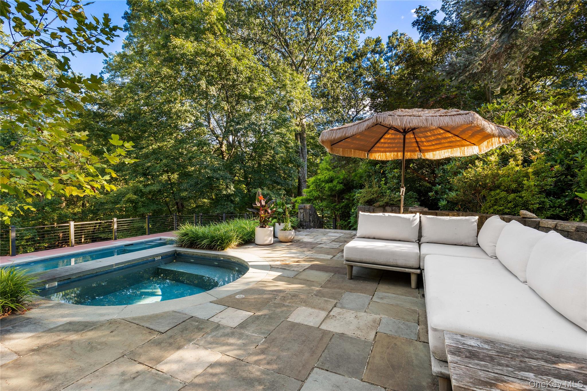 205 Polly Park Road Rye, NY 10580 - Photo 31 of 33 a view of a patio with swimming pool table and chairs