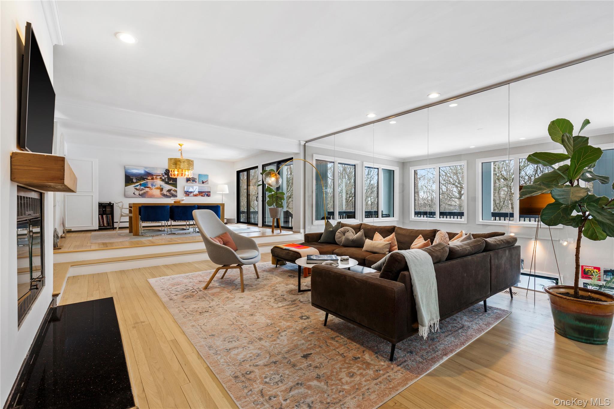 205 Polly Park Road Rye, NY 10580 - Photo 4 of 33 a living room with furniture and a fireplace