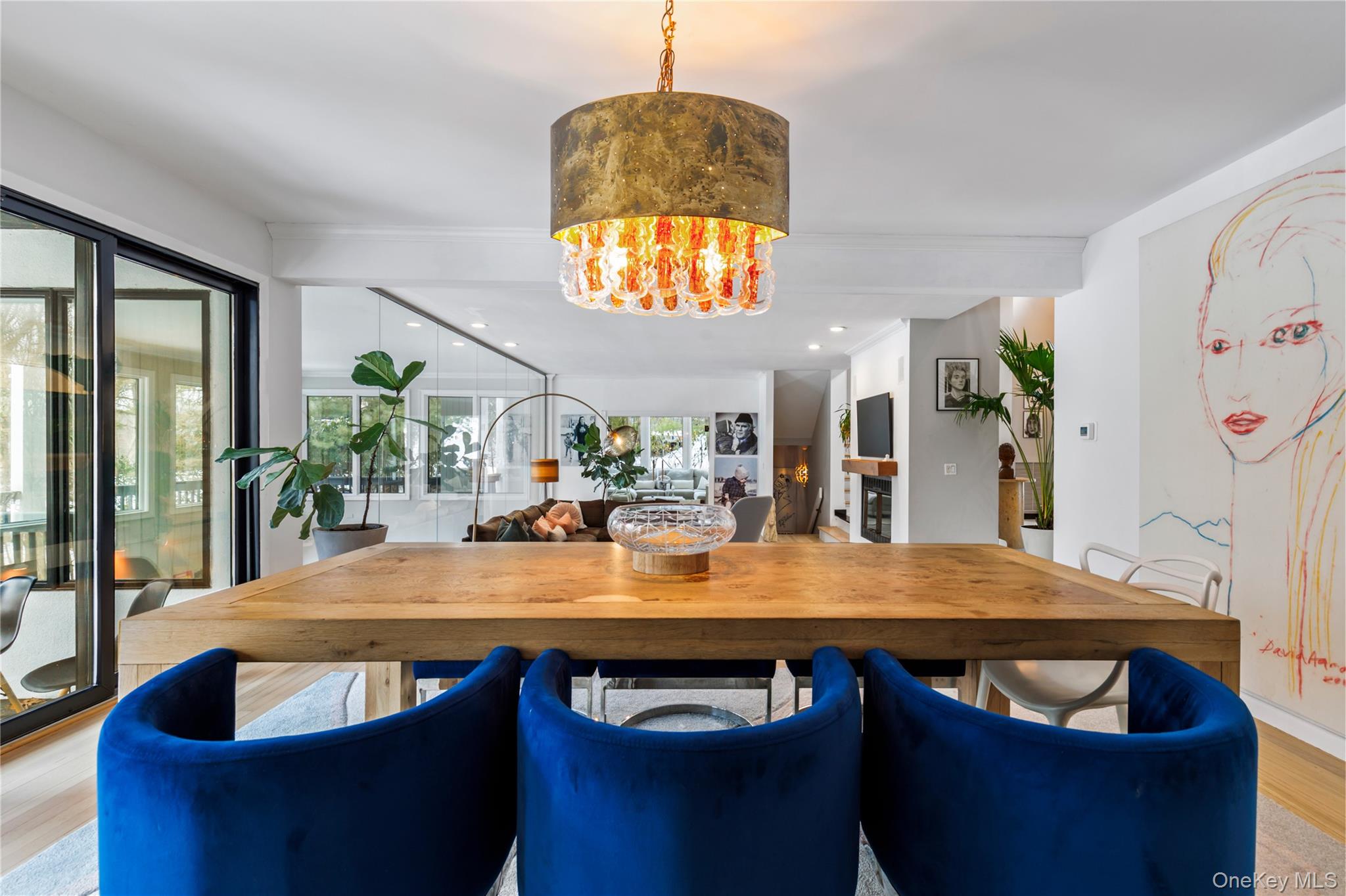 205 Polly Park Road Rye, NY 10580 - Photo 5 of 33 a room with wooden floor table and chairs