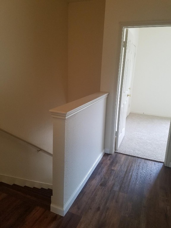 200 Riverbend Drive Georgetown, TX 78628 - Photo 12 of 17 an empty room with wooden floor and windows