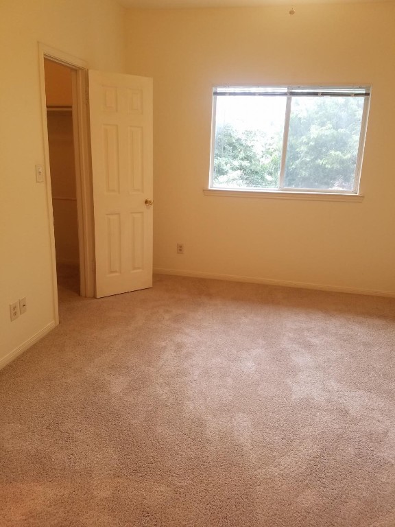 200 Riverbend Drive Georgetown, TX 78628 - Photo 6 of 17 an empty room with windows