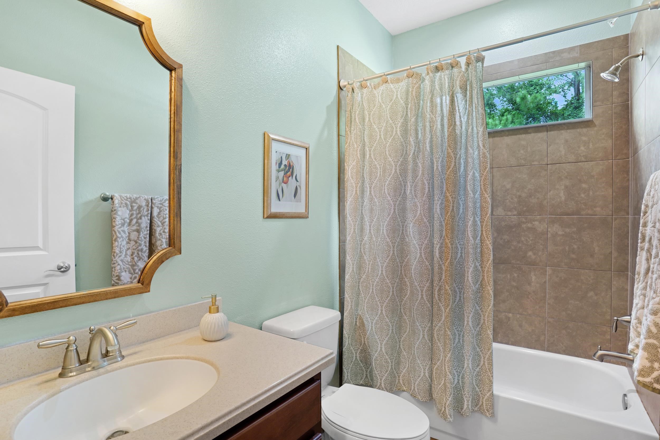 1308 Acorn Ridge Court St. Augustine, FL 32092 - Photo 31 of 47 a bathroom with a sink toilet and shower