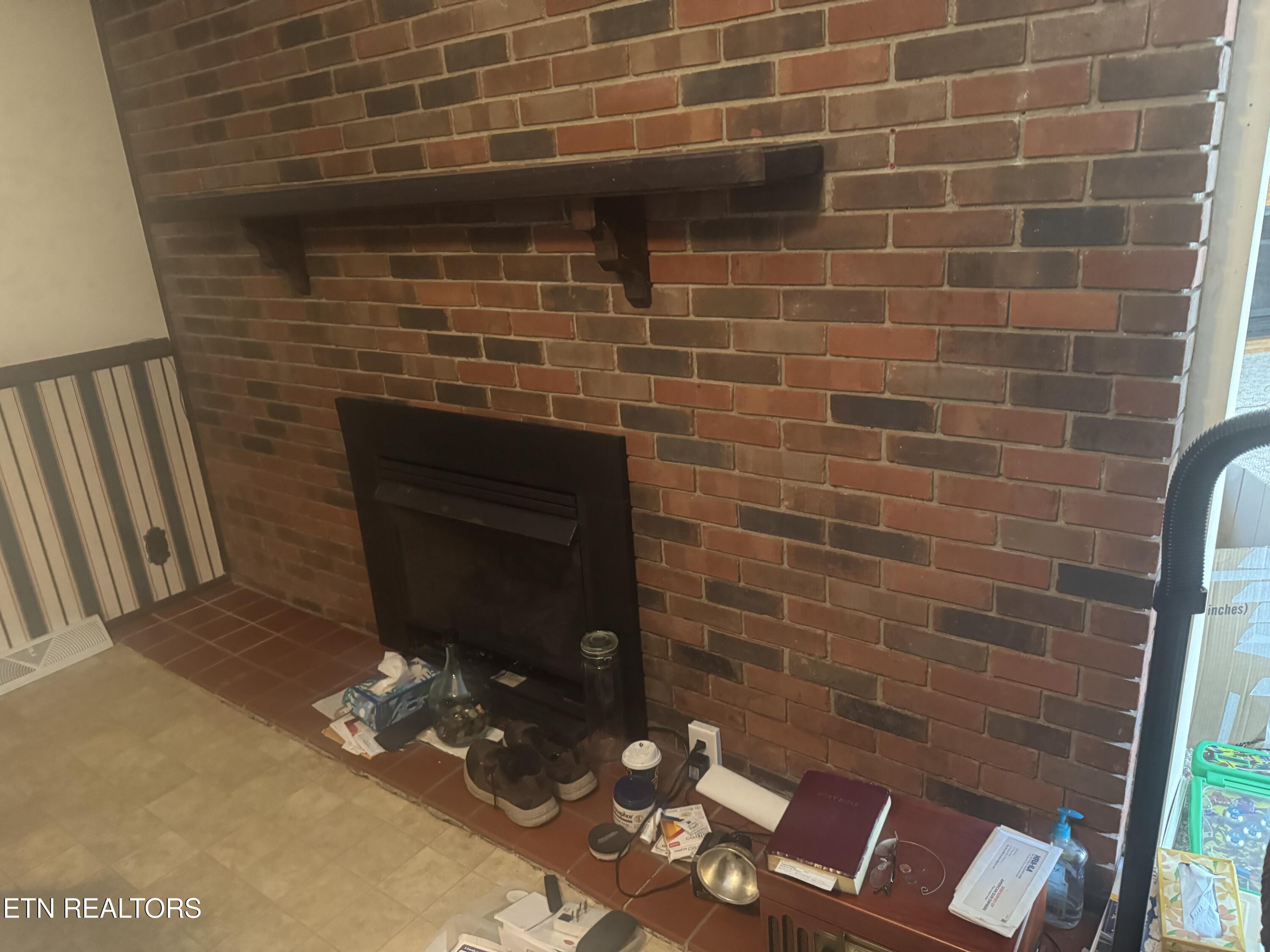 157 Petrey Road La Follette, TN 37766 - Photo 15 of 23 fireplace in dining area