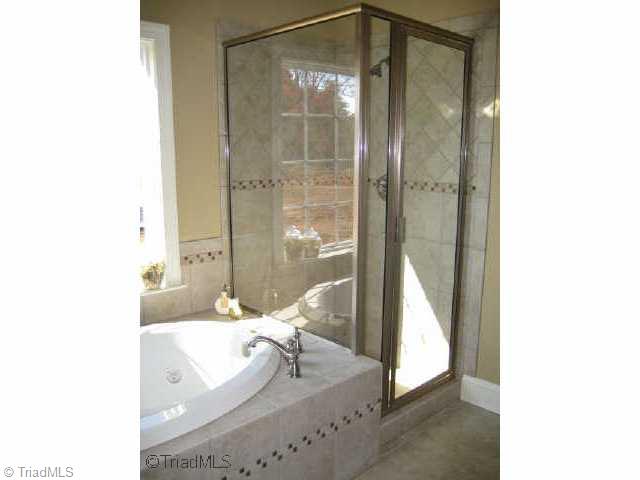 85 The Bluffs Rural Hall, NC 27045 - Photo 5 of 8 Other. Master suite with spa bath.