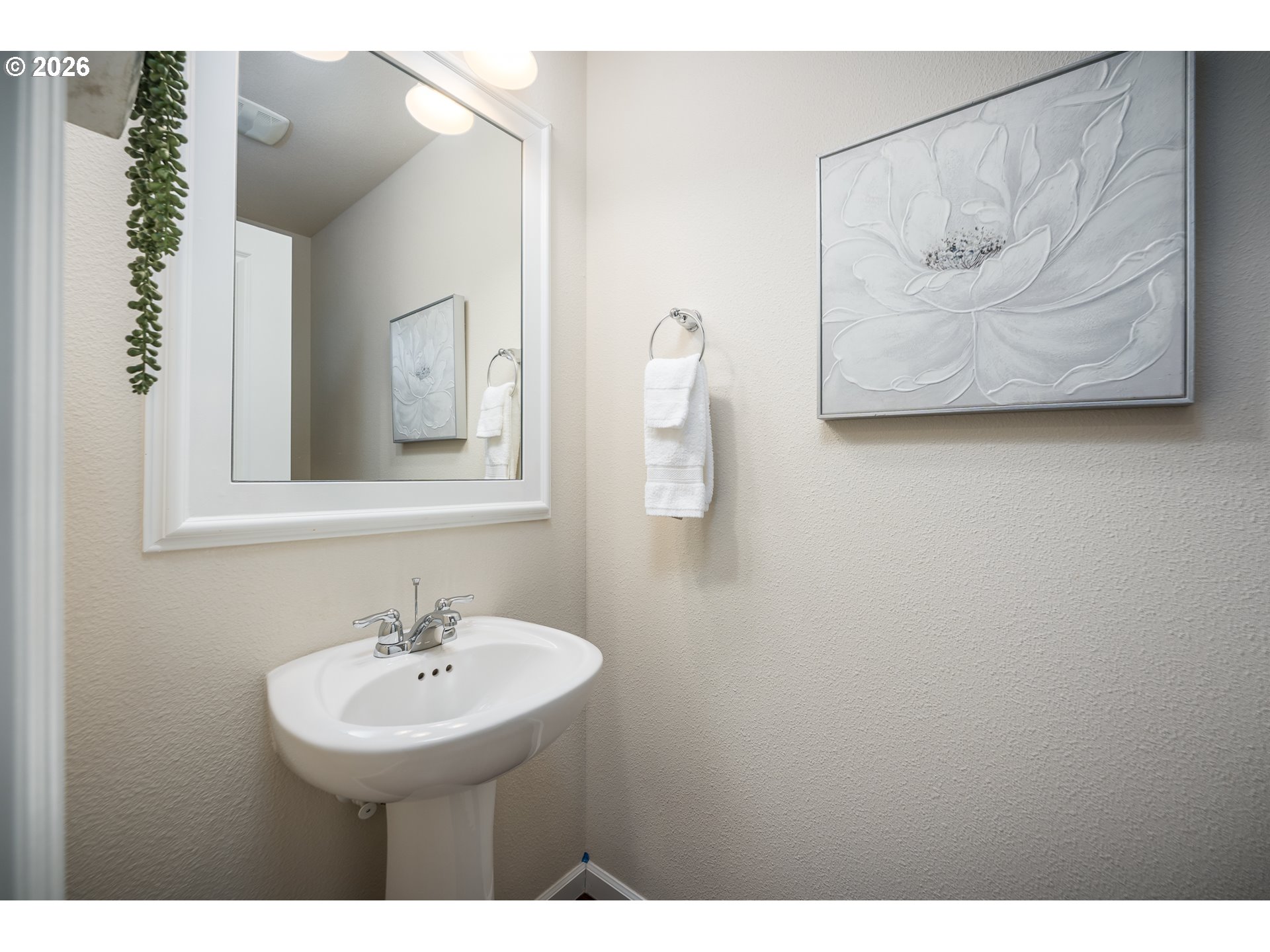 2976 Northwest Persimmon Way Albany, OR 97321 - Photo 12 of 29 a bathroom with a sink and a mirror