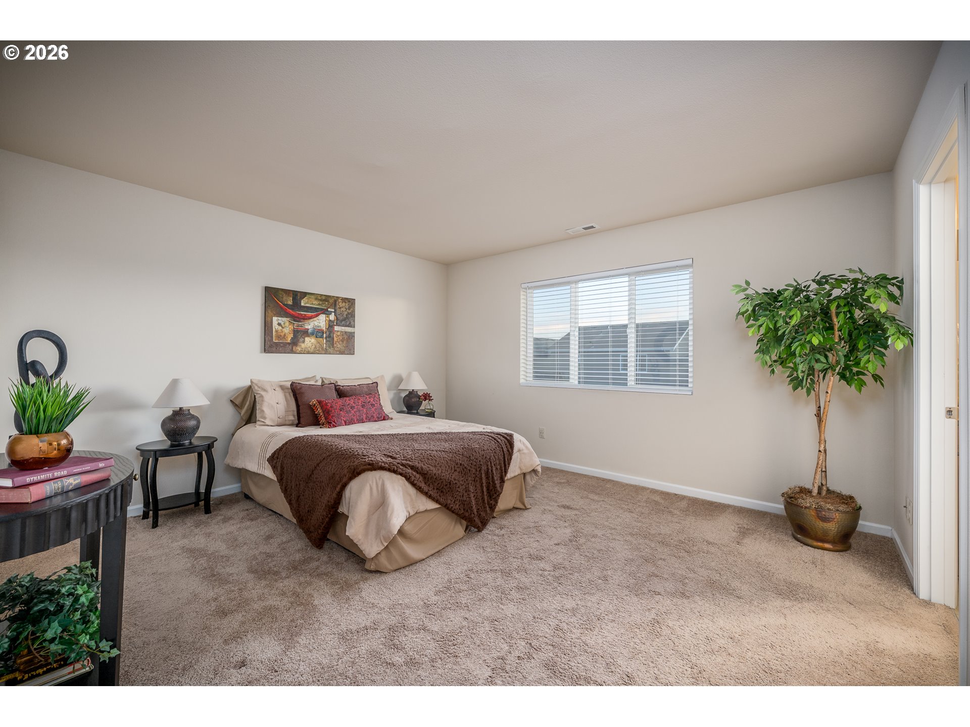 2976 Northwest Persimmon Way Albany, OR 97321 - Photo 13 of 29 a living room with furniture and a potted plant