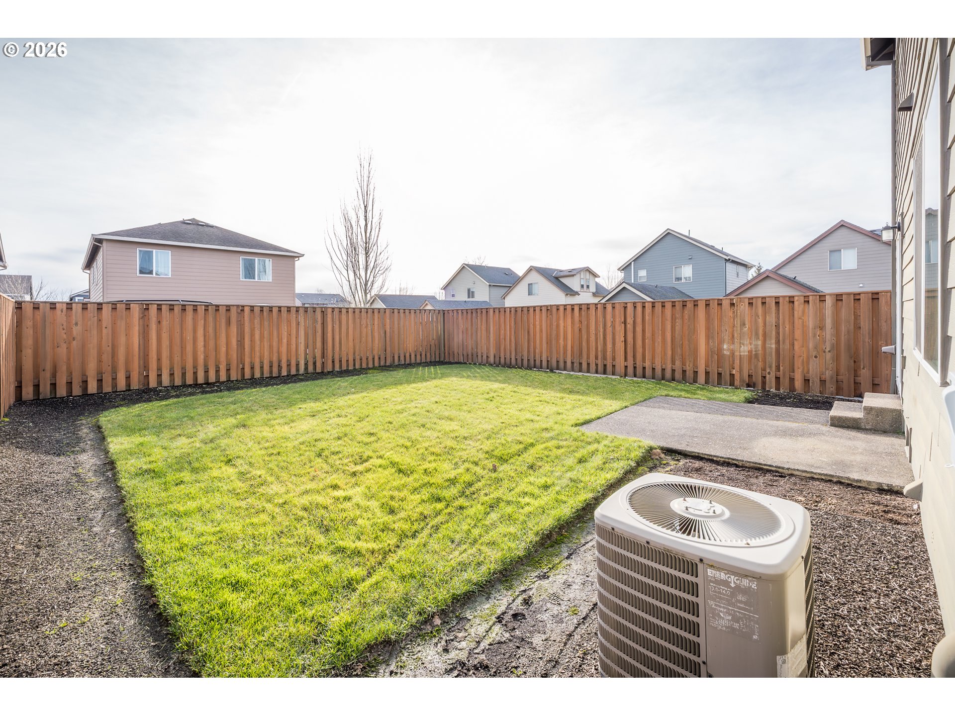 2976 Northwest Persimmon Way Albany, OR 97321 - Photo 20 of 29 a view of swimming pool with a yard and wooden fence