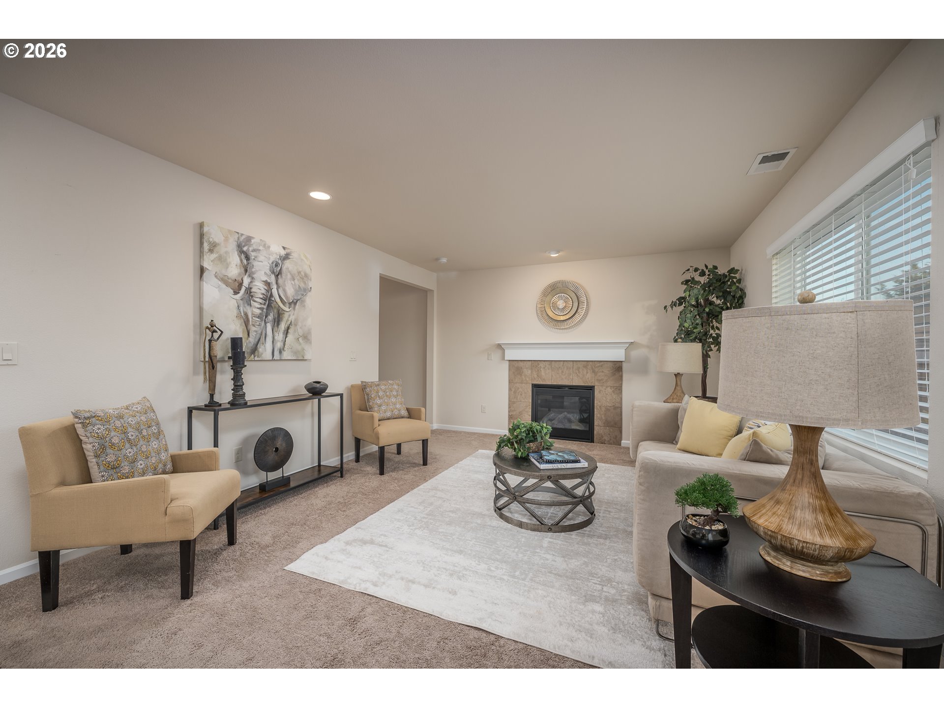 2976 Northwest Persimmon Way Albany, OR 97321 - Photo 6 of 29 a living room with furniture and a fireplace