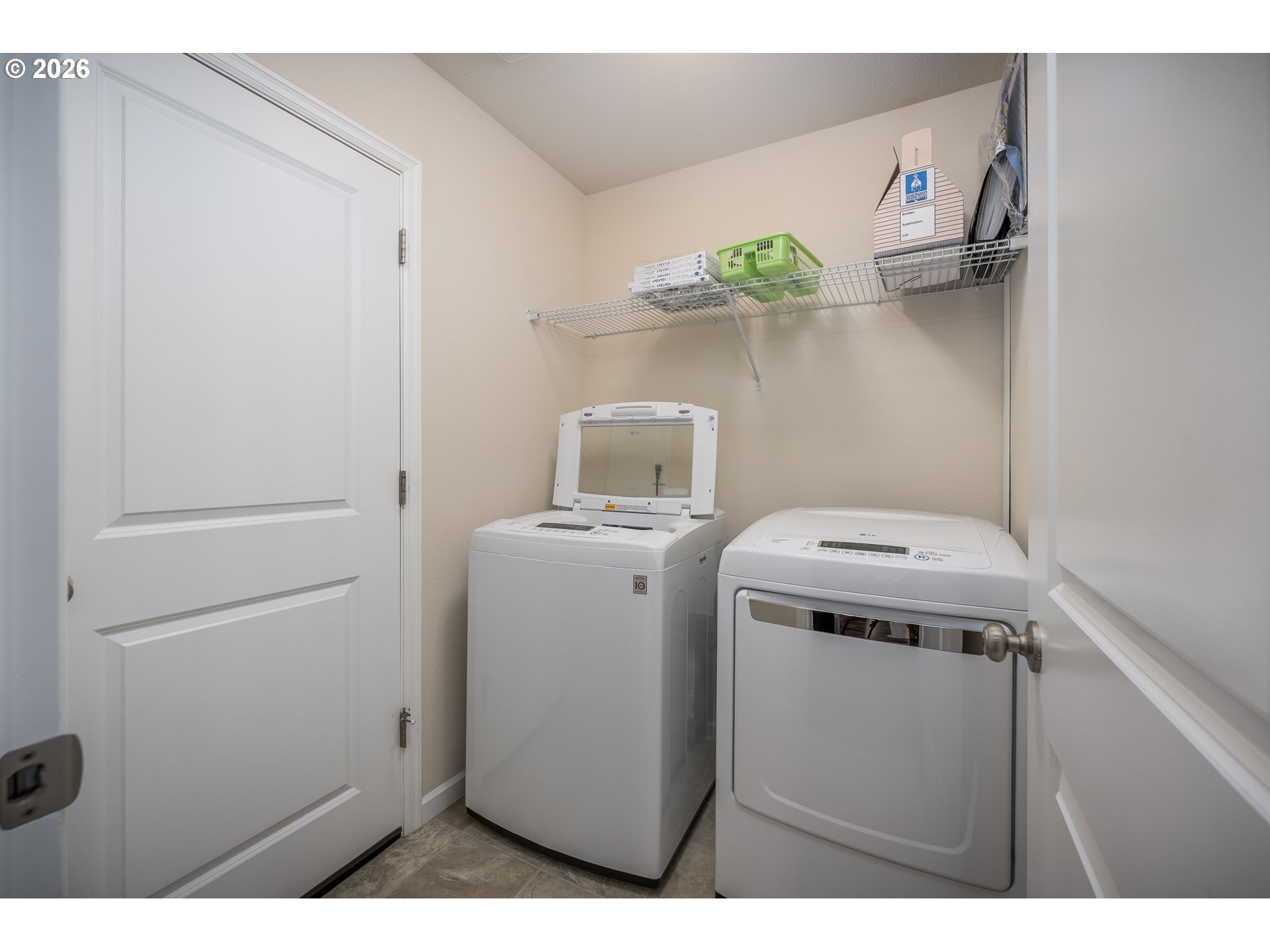 2976 Northwest Persimmon Way Albany, OR 97321 - Photo 10 of 29 a utility room with dryer and washer