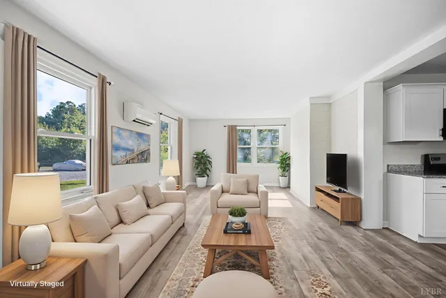 a view of an empty room and a window