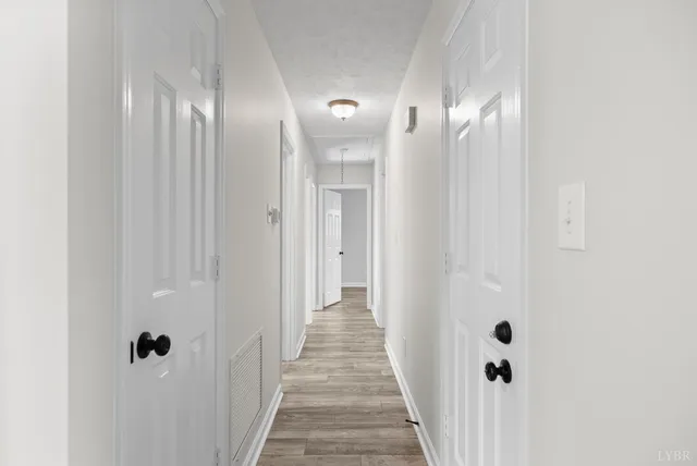 a view of room with window and ceiling fan