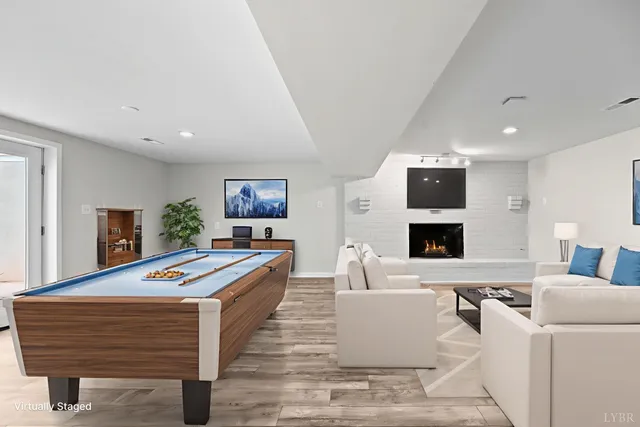 a bathroom with a granite countertop sink a toilet and a mirror