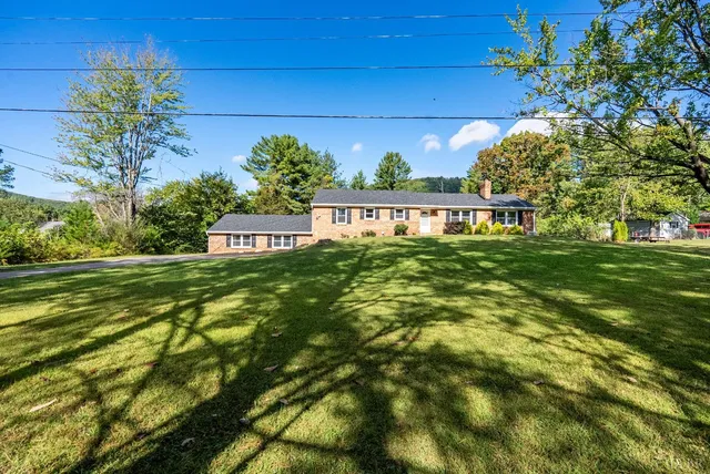 a view of a lake with a mountain