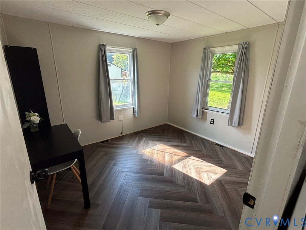 5560 Cartersville Road Powhatan, VA 23139 - Photo 10 of 14 Bedroom 3 with double corner windows.