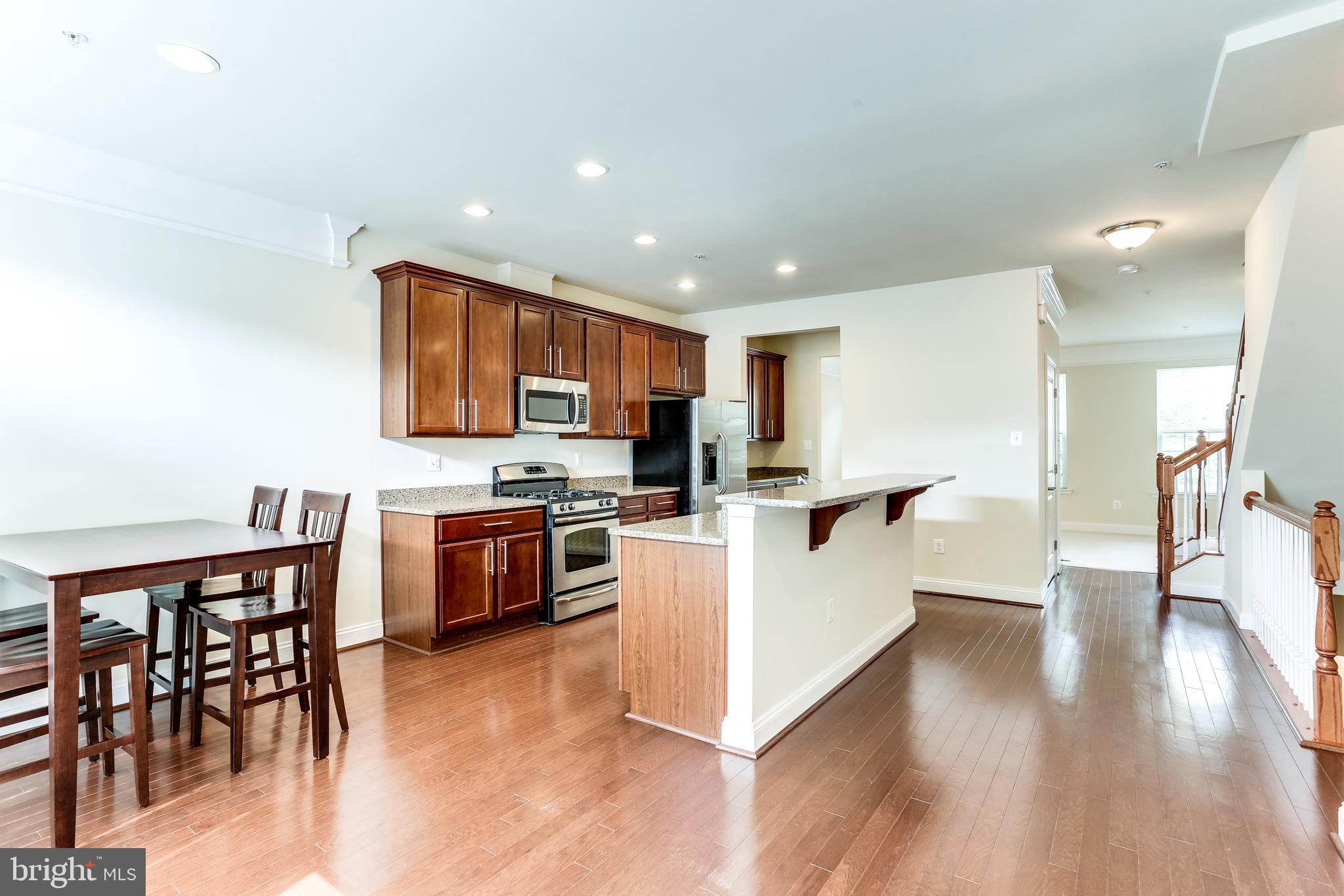 5796 Richards Valley Road Ellicott City, MD 21043 - Photo 13 of 42 Spacious open Family Room & Kitchen