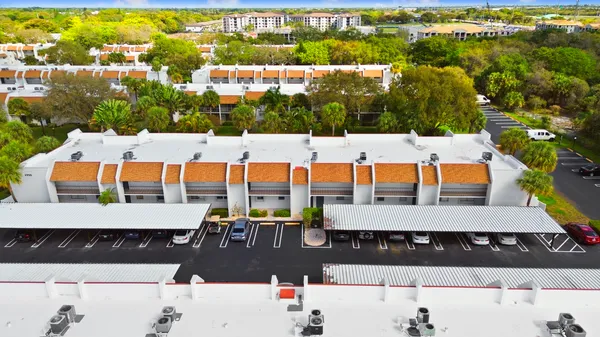 an aerial view of a house with outdoor space