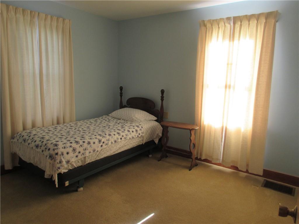 107 Blakely Road Butler, PA 16002 - Photo 11 of 25 a bedroom with a bed and a window