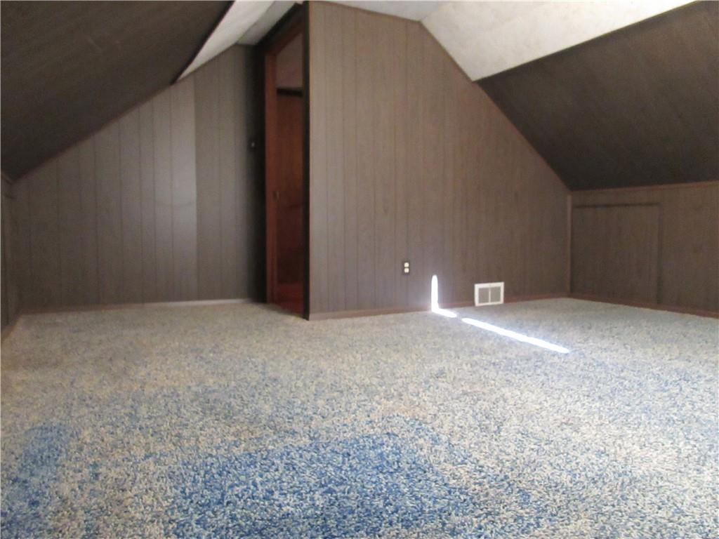 107 Blakely Road Butler, PA 16002 - Photo 13 of 25 a view of a big room with an empty space