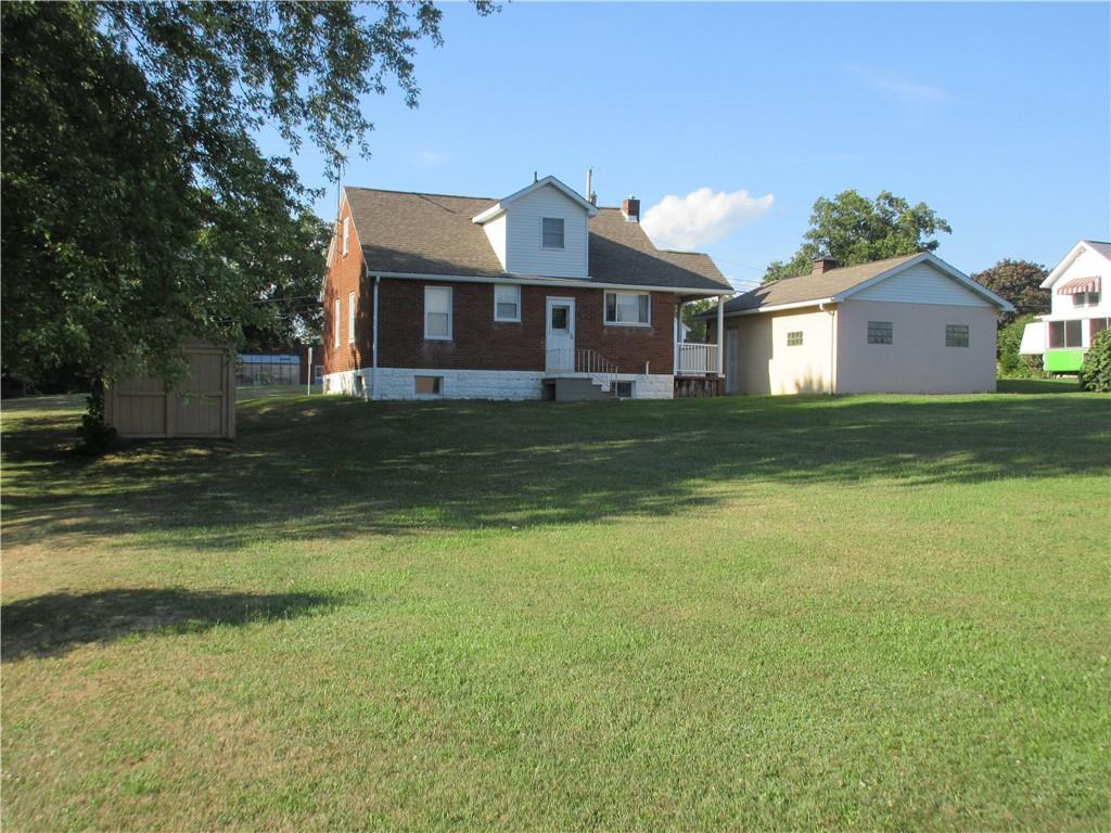 107 Blakely Road Butler, PA 16002 - Photo 21 of 25 a front view of a house with a yard