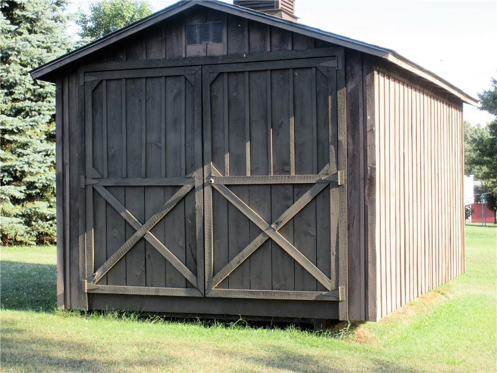 107 Blakely Road Butler, PA 16002 - Photo 24 of 25 a wooden door in front of a house