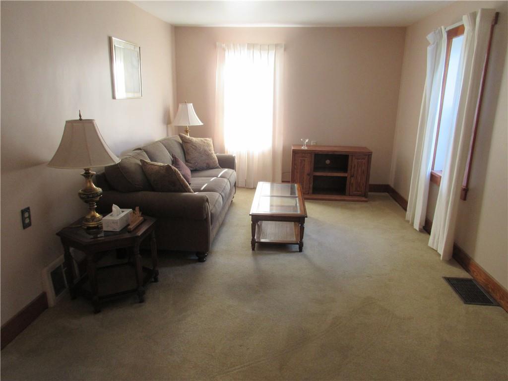 107 Blakely Road Butler, PA 16002 - Photo 6 of 25 a living room with furniture and a window