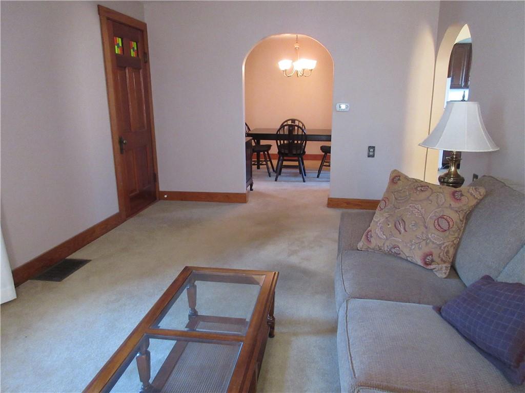 107 Blakely Road Butler, PA 16002 - Photo 7 of 25 a living room with furniture and a table