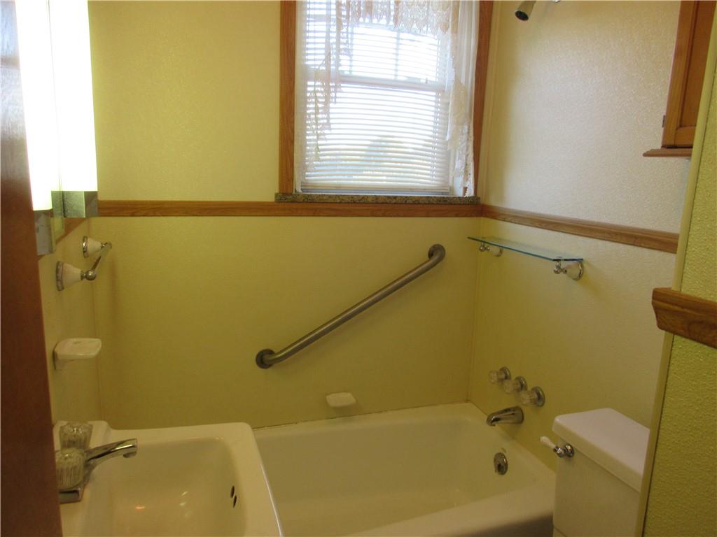107 Blakely Road Butler, PA 16002 - Photo 10 of 25 a bathroom with a sink and a bathtub